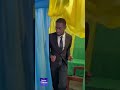 Voting process in a polling room explained