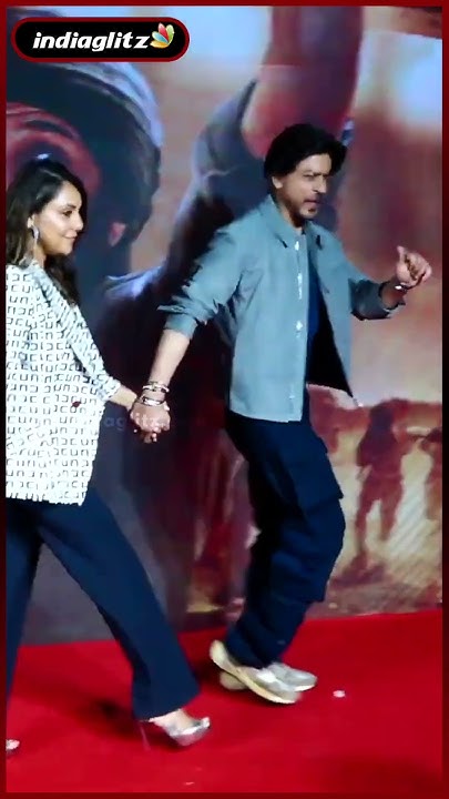 srk-looks-dapper-in-a-black-crewneck-matching-cargo-pants-with-a-grey