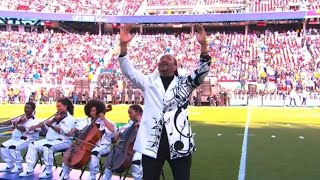 Fred Michael Beam performing ASL version of “Lift Every Voice and Sing” at Super Bowl LX 2026 (CC)