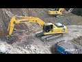 Komatsu pc 350  excavator loading trucks