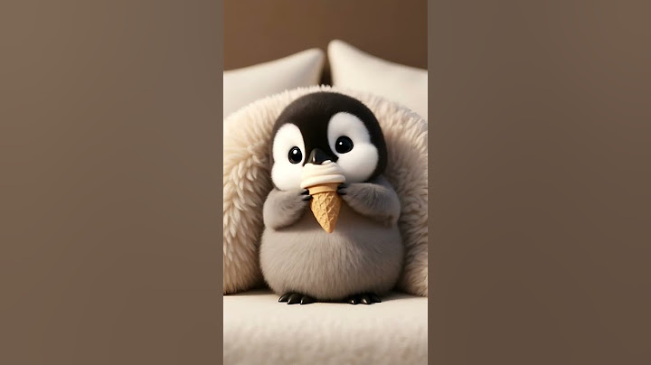 A Penguin Eating Ice Cream #cute #penguin