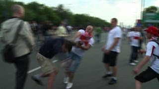 Police use tear gas on Euro 2012 Poland-Russia brawlers