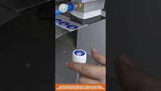 Automated Cap Labeling Machine in Action!