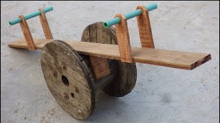 How to Make a Seesaw out of an abandoned wooden reel