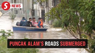 Major roads in Puncak Alam submerged, stranding motorists