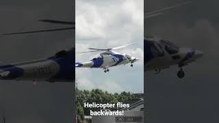 Helicopter flies backwards in London! #Shorts