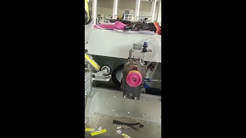 Automatic back adhesive hook and loop tape winding cutting machine