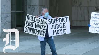 A protest was held at the george allen court building in downtown
dallas. civil rights leaders and citizens were there to support judge
eric moye. he's t...