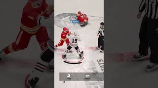 Big fight W after the big hit #nhl25 #nhl #gamehockey #fight #win #fyp #shorts #gaming #rookie