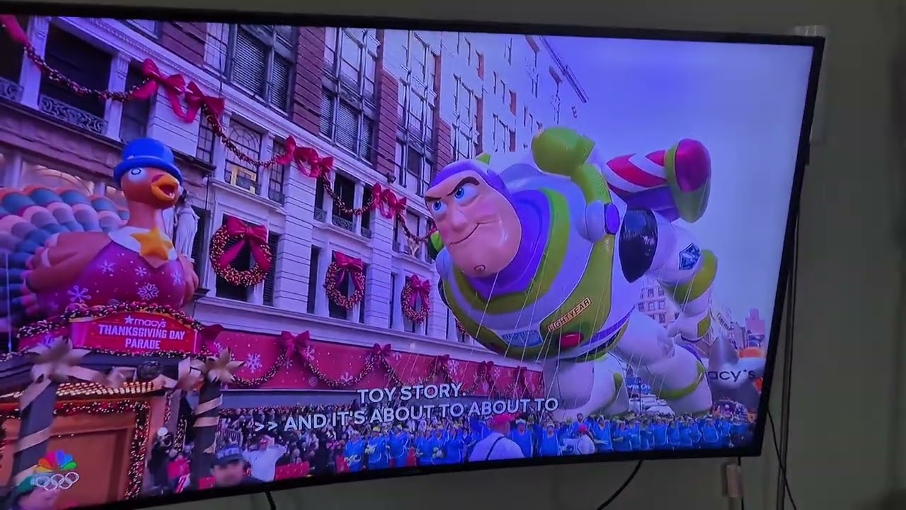 The buzz lightyear balloon is back in the parade and see him