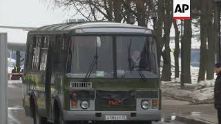 Buses leaving airport in Moscow where expelled diplomats were expected to return