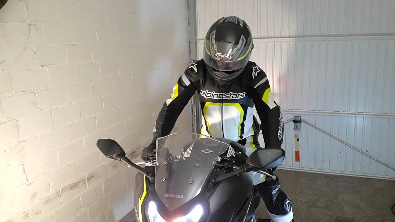 Gay biker smokes after the tour........