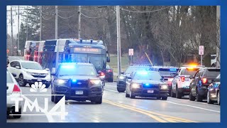 Parents anxiously wait for kids at reunification sight after school shooting