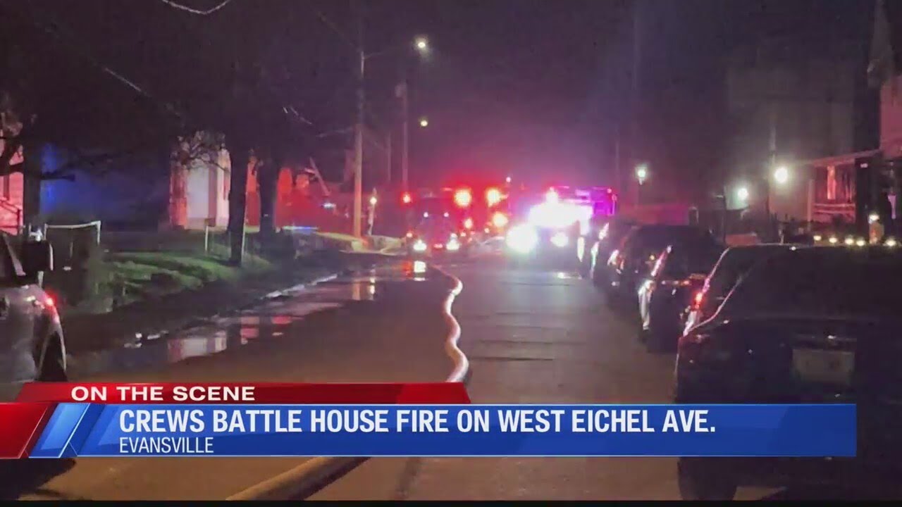 Crews battle house fire in Evansville - YouTube