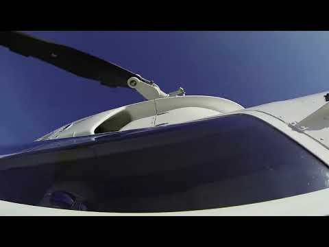 A still from the video Grown-up Travel Adventure: Victoria Falls Helicopter "Flight of Angels" in Zimbabwe by Andy Higgs