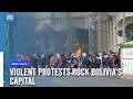 Protests Rock Bolivia's Capital As Miners Demand President Paz's Resignation
