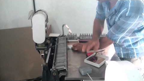 RIGID BOX CORNER TAPING MACHINES