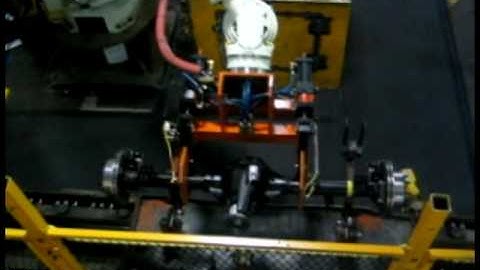 Loading Mining Truck Wheel Axles - Kawasaki Robotics