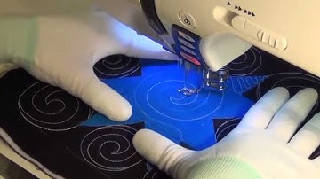 48. Free Motion Quilt Spirals into a Sawtooth Star Block