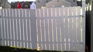 Simtek Fence Next To White Vinyl