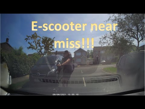 E-scooter near miss caught on dashcam - almost a head on collision