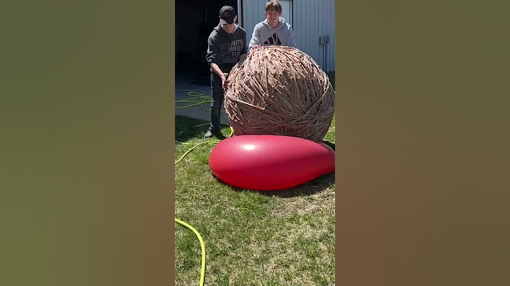 1300LB Rubber Band Ball Vs. Giant Water Balloon #Shorts