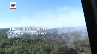 Firefighters battle wildfires in France