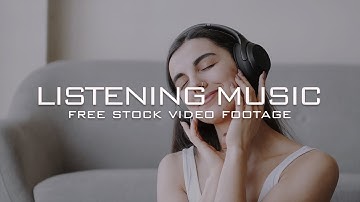 60+ Person Listening To Music Free Stock Video Footage | Listens To A Music Through An Earphone