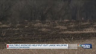Multiple agencies help put out large wildfire near Kansas-Oklahoma state line