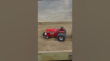 RC tractor pulling with a nice looking IH tractor