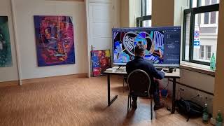 Digital artist at work in his beautiful studio / gallery.
