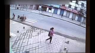 Girl swallowed by pavement in China