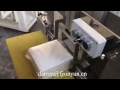 Semi automatic plastic bag napkin paper packaging machine