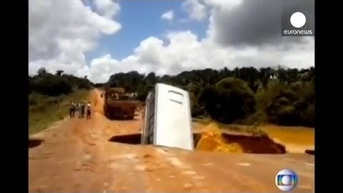 Shocking Video of Tourist Bus Plunging Into Sinkhole