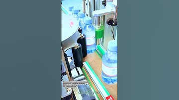 Automatic Bottle Labeling Machine on Drinking Water Production Line #manufacturing