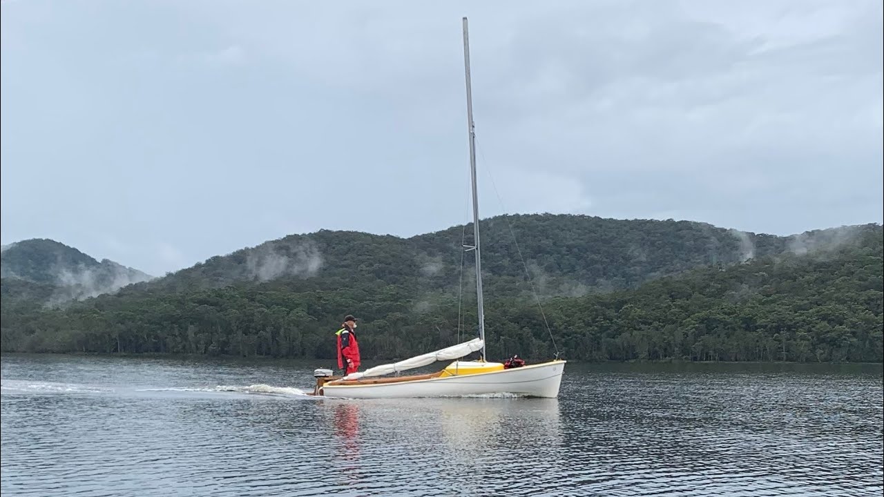 Dinghy cruising Myall lake in the rain