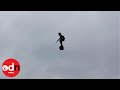 Man Rockets through the Air in Paris as France Celebrates Bastille Day with Parade