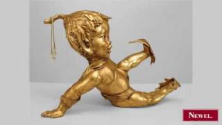 Antique Italian Rococo style gilt tole cupid (pixie) with