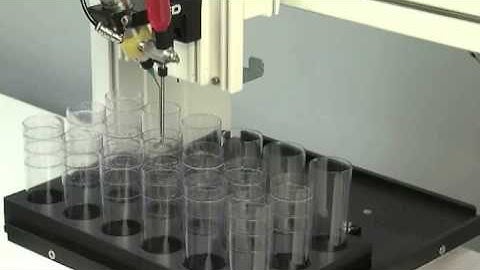 7860C-RS Radial Spinner System Applying Bands of Fluid - Nordson EFD