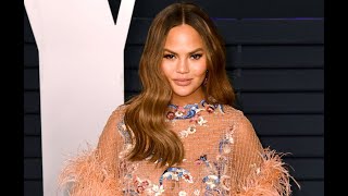 Chrissy Teigen Claps Back at Troll Who Tells Her to 'Cover Up' Her Breasts