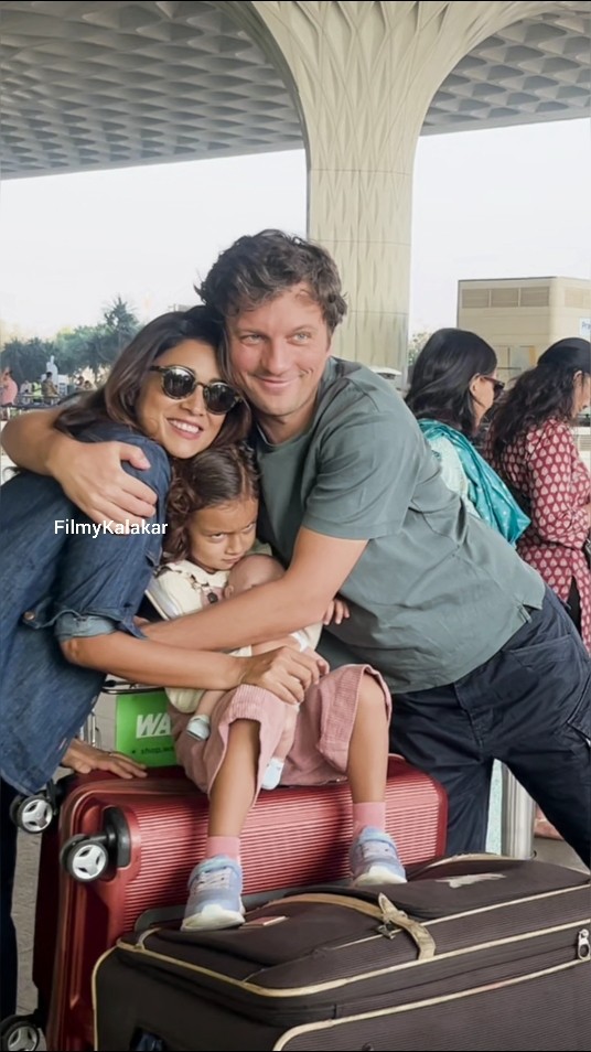 #shriyasaran 's lovely squishy moments with her family at the airport ❤️ #filmykalakar