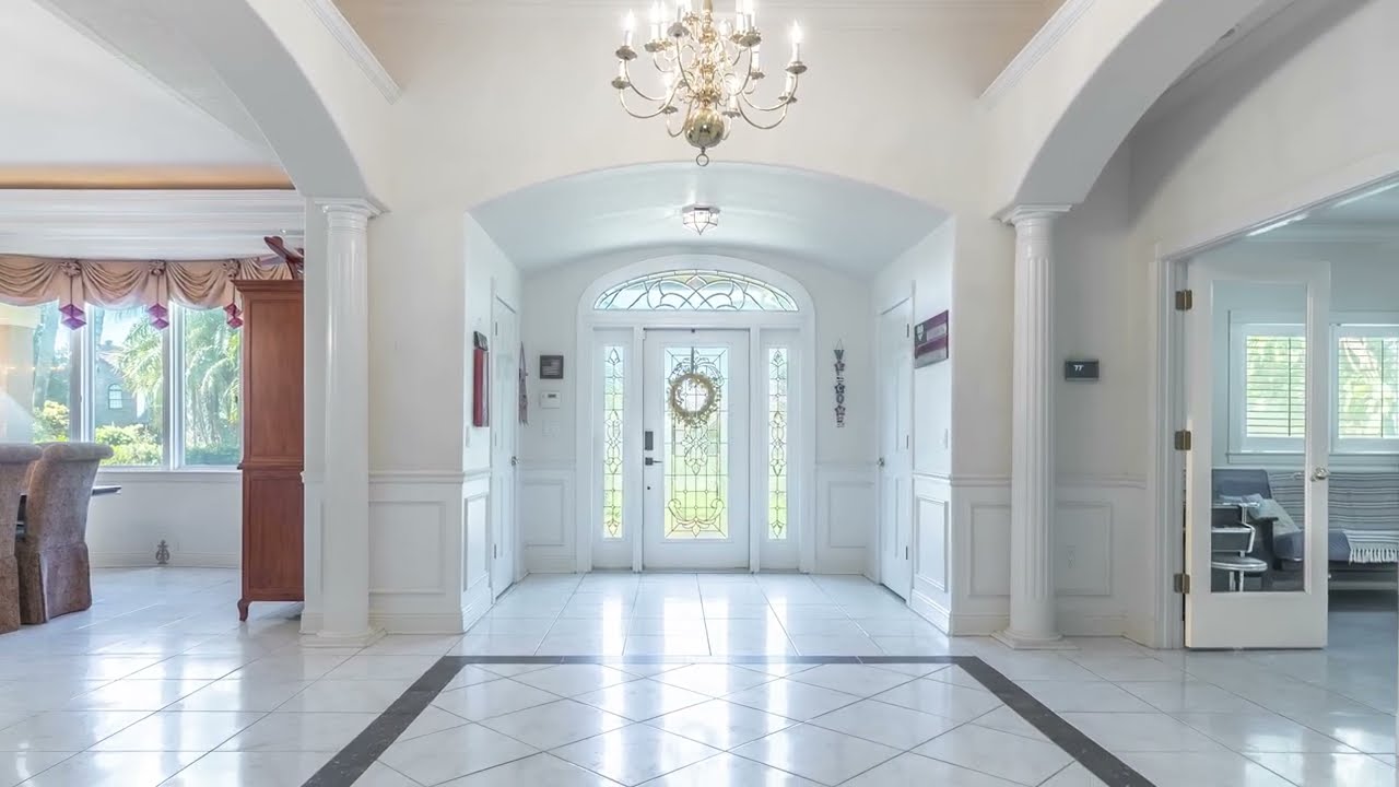 FOR SALE in Merritt Island, FL w/ boat slip, 1 acre, 5 bed, 4 car garage!