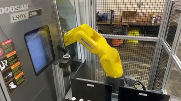 JHR-100 MACHINE TENDING SYSTEM INTEGRATED TO DOOSAN LYNX 2100