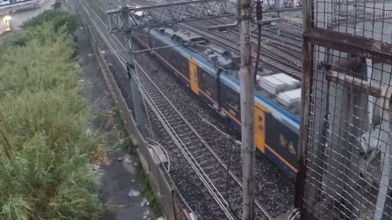 Alstom POP EMU rushing by the bridge on Via Emiro Giafar