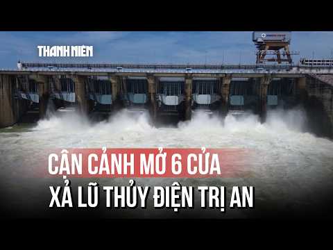 Close-up of the moment Tri An Hydropower Plant increases flood discharge as sirens sound