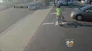 Footage Shows Young Boy On Bike Being Struck In Suspected Hit-And-Run
