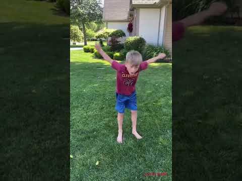 Little kid does a crazy backflip!
