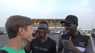 Taxi drivers surround me on arrival to Bamako, Mali