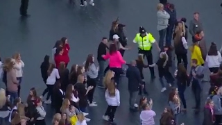 Police officer dances with fans at 'One Love Manchester' concert