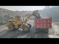 Caterpillar 966E Wheel Loader Heavy Rock Loading On Dump Trucks & Trolleys | Mining Work
